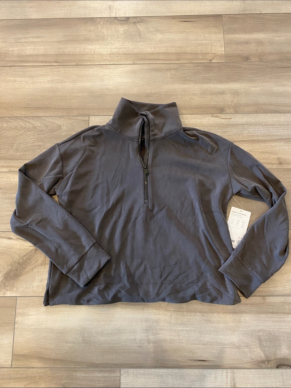 NWT Athleta seasoft quarter zip. Size medium.